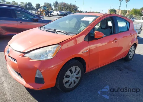 2012 Toyota Prius C One from USA, damaged, VIN JTDKDTB35C1011354